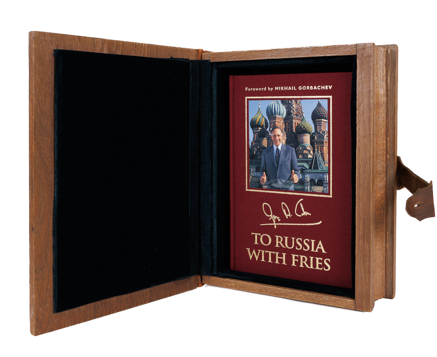 <center> George Cohon + 	Mikhail Gorbachev <br><i> To Russia With Fries </i><br> 1997 Special Edition in <br><i>Carved Wood and Leather Presentation Box </i><p> McDonald's </center>